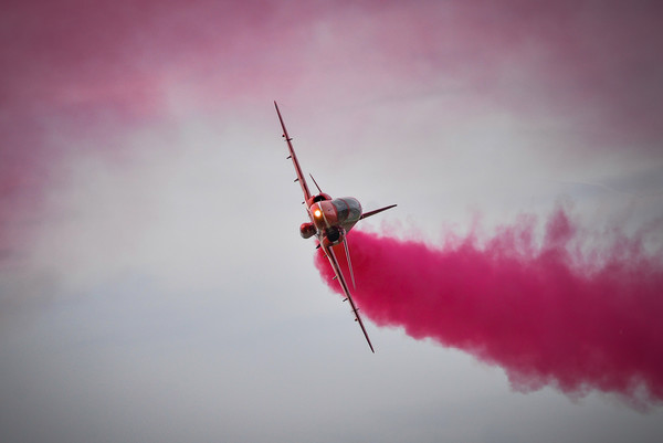 RAF Red Arrow Hawk Jet with smoke on  Picture Board by Andrew Scott