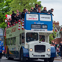Buy canvas prints of Lincoln City FC Open Top bus parade by Andrew Scott