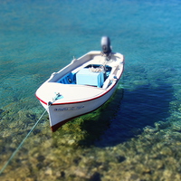 Buy canvas prints of Greek Island Boat by Suzanne Whaley