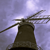 Buy canvas prints of  Bircham Windmill and Stormy Skies by Paul Stokes
