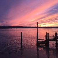 Buy canvas prints of  Poole Harbour Sunset by Tom Coombes