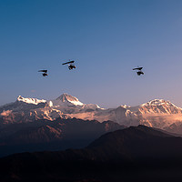 Buy canvas prints of Flying Ultralight over Annapurna ii by Ambir Tolang