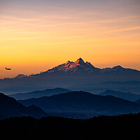 Buy canvas prints of Shining Mount Manaslu range and landing airplane at Kathmandu, Nepal  by Ambir Tolang