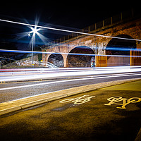 Buy canvas prints of Arches Light Trails by Gary Turner