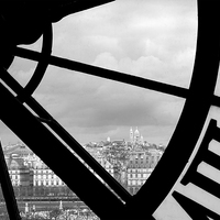 Buy canvas prints of  Paris through the clock window of the Musee d'Ors by Adrian Beese