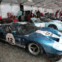 Buy canvas prints of  Ford GT40's in the Classic LeMans paddock by Adrian Beese