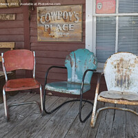 Buy canvas prints of Coloured chairs on a cowboy veranda by Adrian Beese