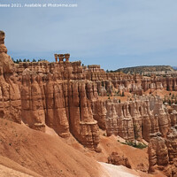 Buy canvas prints of Crimson Hoodoos Bryce Canyon National Park by Adrian Beese