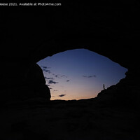 Buy canvas prints of Sunrise through the North Window Arch by Adrian Beese