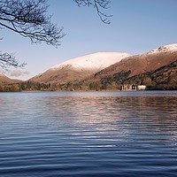 Buy canvas prints of Grasmere with snow capped fells in the background. by Andy Blackburn