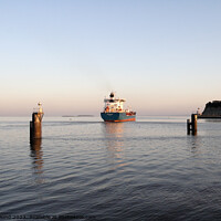Buy canvas prints of Cargo ship departs by Kevin Round