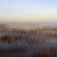 Buy canvas prints of Blurred Cold Winter Beach by Kevin Round