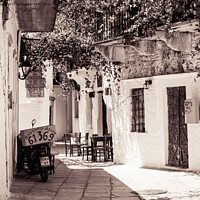 Buy canvas prints of Greek side street, Naxos by Jo Sowden