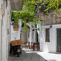 Buy canvas prints of Greek side street, Naxos ( colour) by Jo Sowden