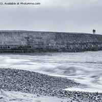 Buy canvas prints of Walking along from the Cobb, Lyme Regis by Jo Sowden