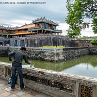 Buy canvas prints of Artist at work, Imperial Citadel, Hue, Vietnam by Jo Sowden
