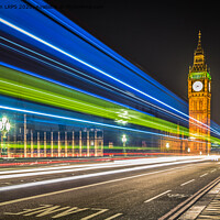 Buy canvas prints of Light trails in front of the Houses of Parliament, by Jo Sowden