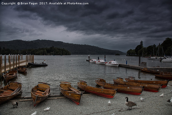 Dark Clouds over windermere Picture Board by Brian Fagan
