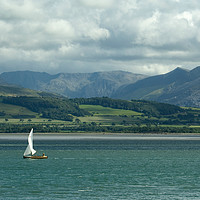 Buy canvas prints of Snowdonia from the Menai Straits on a cloudy day by John Mitchell