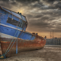Buy canvas prints of  Old rusty ship being broken for scrap by clifford Spittle
