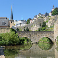 Buy canvas prints of Luxembourg old town viewed from the Grund quarter by Mark Roper