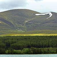 Buy canvas prints of  Across Loch Morlich to Cairn Gorm by John Vaughan
