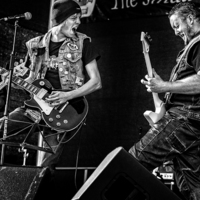 Buy canvas prints of SnakeByte gigging at the Eastbourne Steampunk Fest by Len Brook