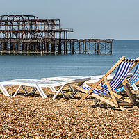 Buy canvas prints of Brighton Beach West Pier Deckchairs. by Len Brook
