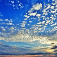 Buy canvas prints of  Scattered clouds by Teresa Moore