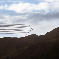 Buy canvas prints of Red arrows over ochils  by Jade Scott