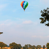 Buy canvas prints of Hot Air Balloon over English Landscape by tim miller