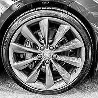 Buy canvas prints of Close up monochrome photo of a Tesla electric car  by Naylor's Photography