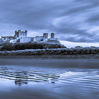 Buy canvas prints of Bamburgh Castle in Blue by Naylor's Photography