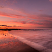 Buy canvas prints of Bamburgh beach red sunset by Naylor's Photography