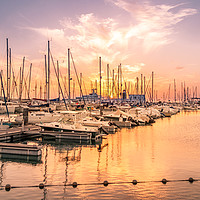 Buy canvas prints of Fiery sunset over the Marina  by Naylor's Photography