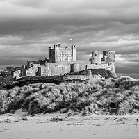 Buy canvas prints of Strikingly Beautiful Bamburgh Castle by Naylor's Photography