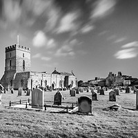 Buy canvas prints of Pretty church of St Aidans in Bamburgh in Mono by Naylor's Photography