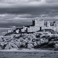 Buy canvas prints of Cool Bamburgh Castle by Naylor's Photography