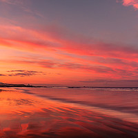 Buy canvas prints of Super Red Sky at Bamburgh Beach by Naylor's Photography