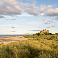 Buy canvas prints of A different view Bamburgh Castle by Naylor's Photography