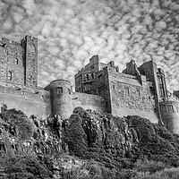 Buy canvas prints of Bamburgh Castle view in Mono by Naylor's Photography