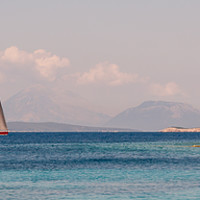 Buy canvas prints of Drifting by Emblisi beach in Fiskardo by Naylor's Photography