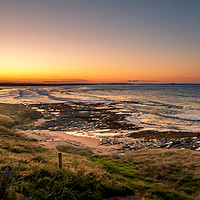 Buy canvas prints of Bamburgh beach sunset  by Naylor's Photography