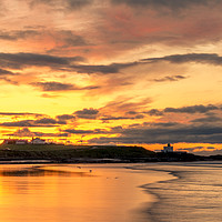 Buy canvas prints of Dreamy Bamburgh sunset at the beach by Naylor's Photography