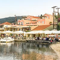 Buy canvas prints of Fiscardo waterfront facing Elli's restaurant by Naylor's Photography