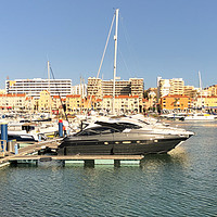 Buy canvas prints of Vilamoura marina yachts and speedboats by Naylor's Photography
