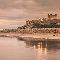 Buy canvas prints of Time to reflect at Bamburgh Castle by Naylor's Photography