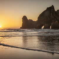 Buy canvas prints of Wharariki Beach Sunset, New Zealand by Colin & Linda McKie