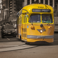 Buy canvas prints of Yellow Vintage Streetcar San Francisco by Colin & Linda McKie