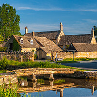 Buy canvas prints of Lower Slaughter Footbridge Reflections by David Ross